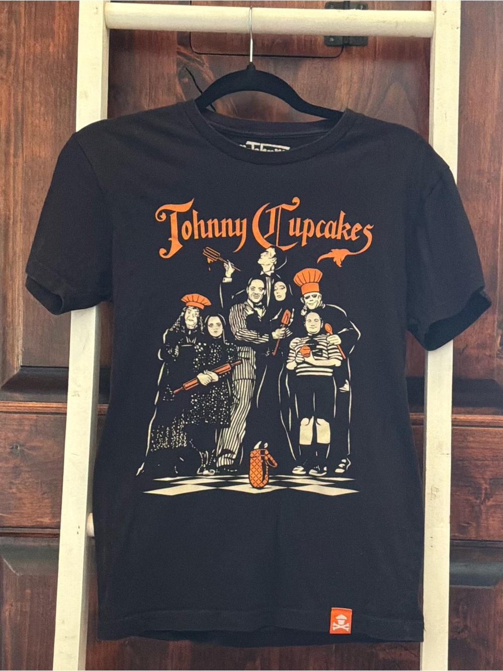 Johnny Cupcakes Kids Black Graphic Tee with Orange Print
